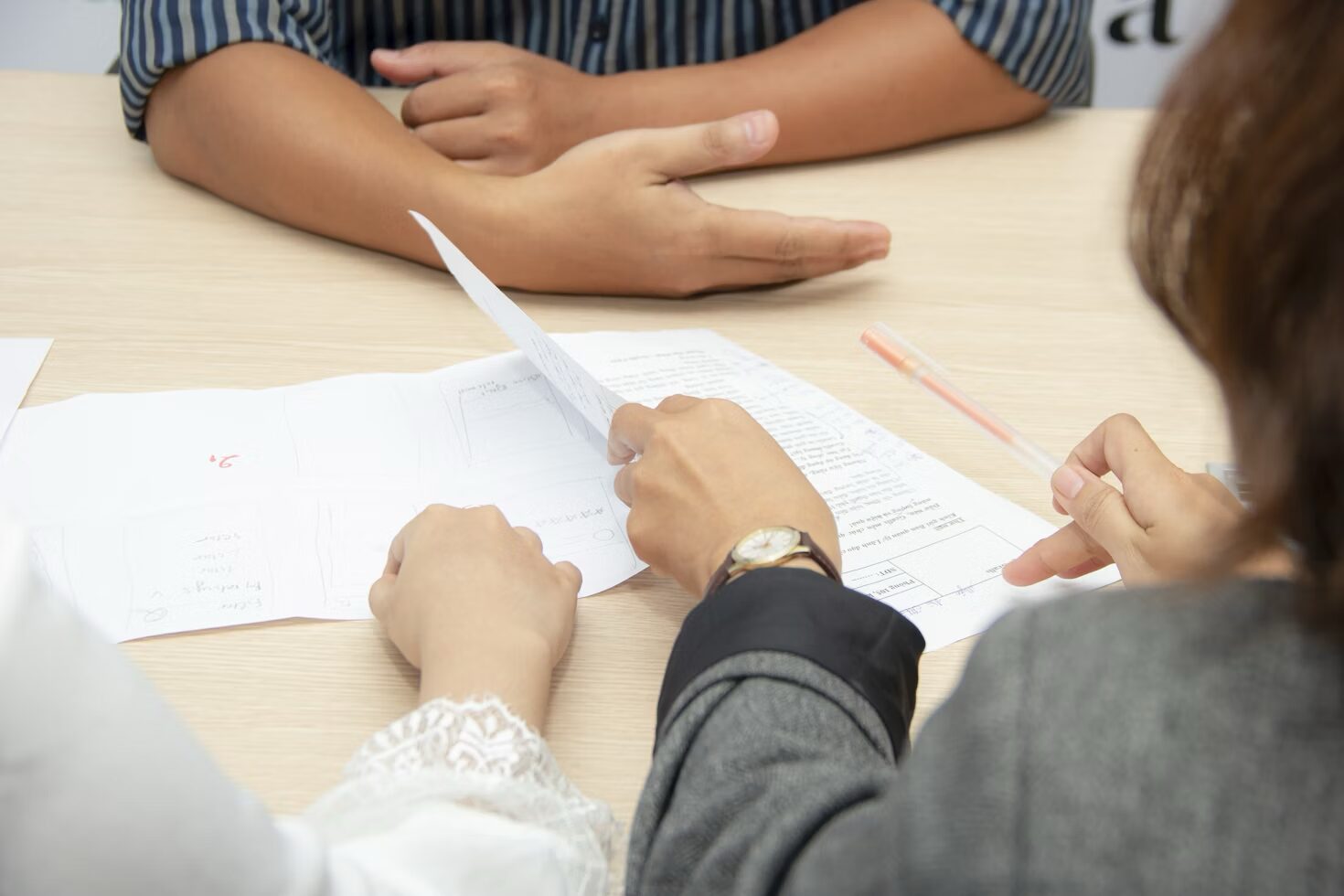a public adjuster working with a policyholder